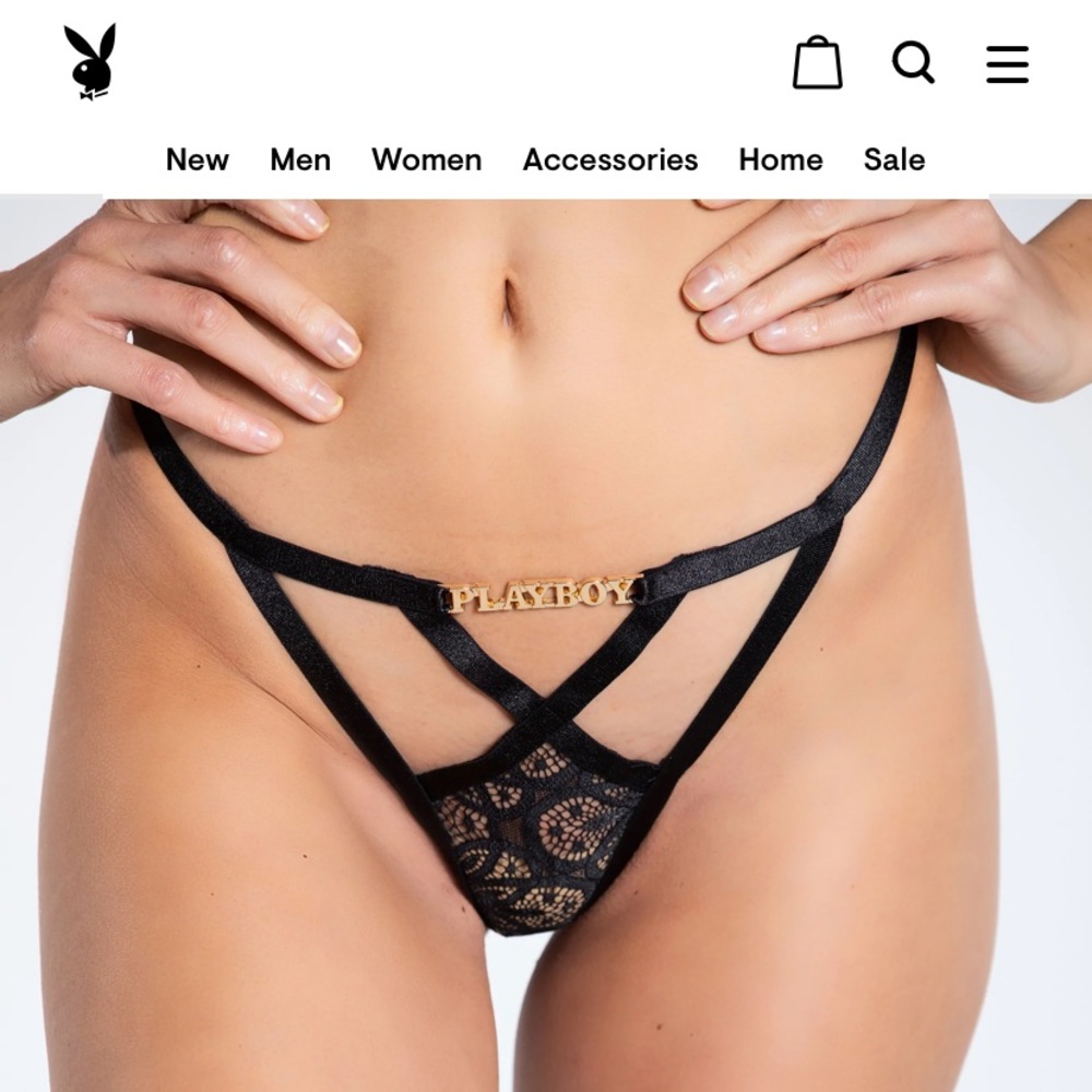 Brand new with tags playboy thong panty. Black and gold lace. Metal emblem